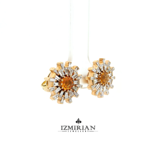 Rose gold earring side profile with orange sapphire center and tapered baguette diamonds