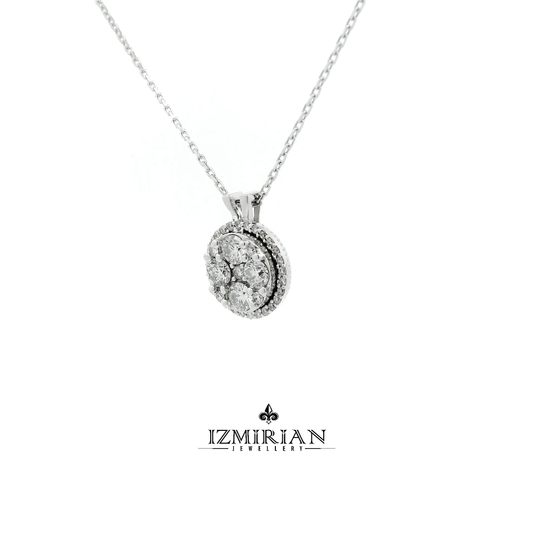 Angled view of round diamond cluster pendant in white gold