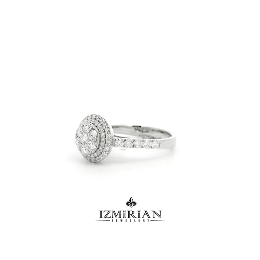 Angled view of round diamond cluster ring with halo setting