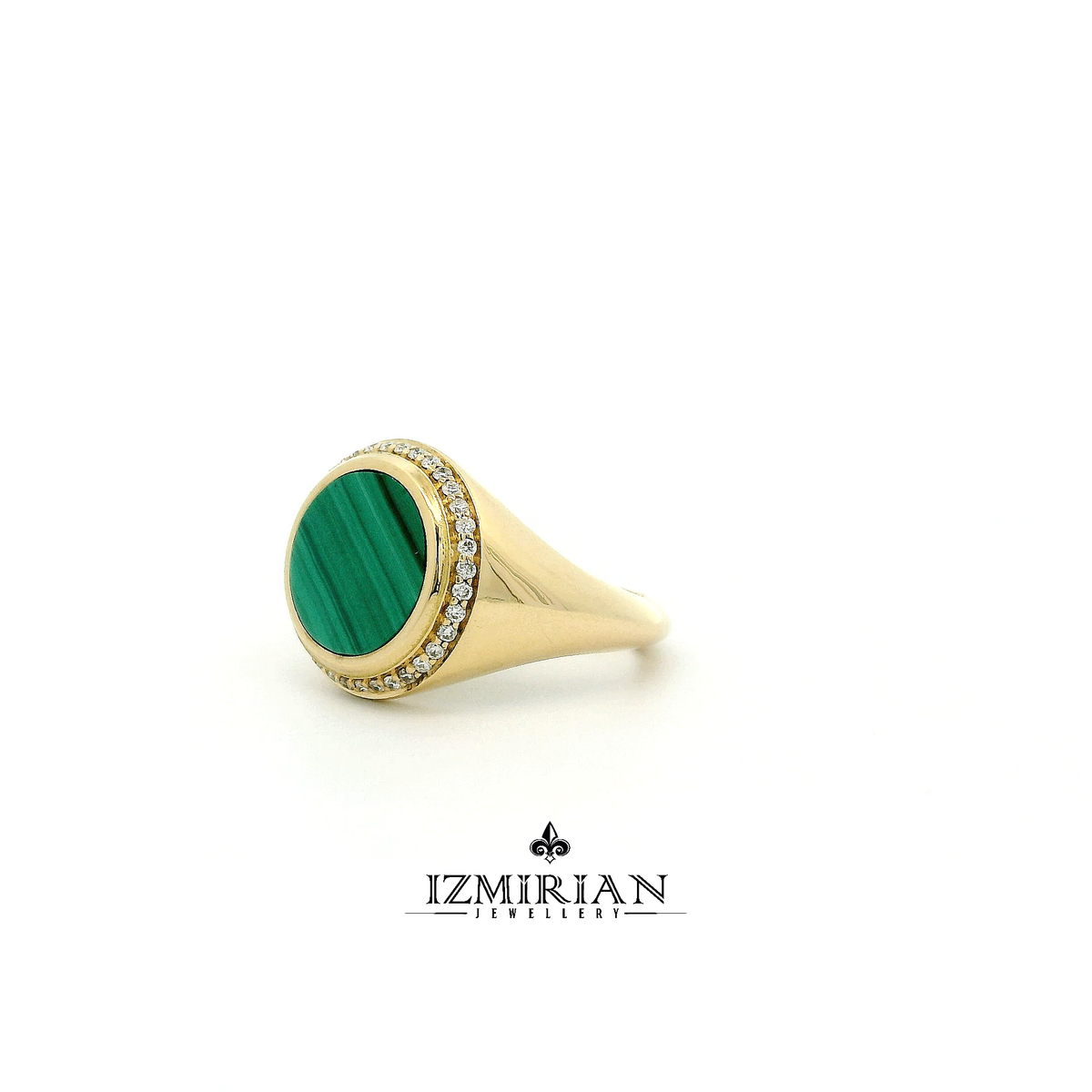 Angled view of malachite and diamond signet ring in yellow gold