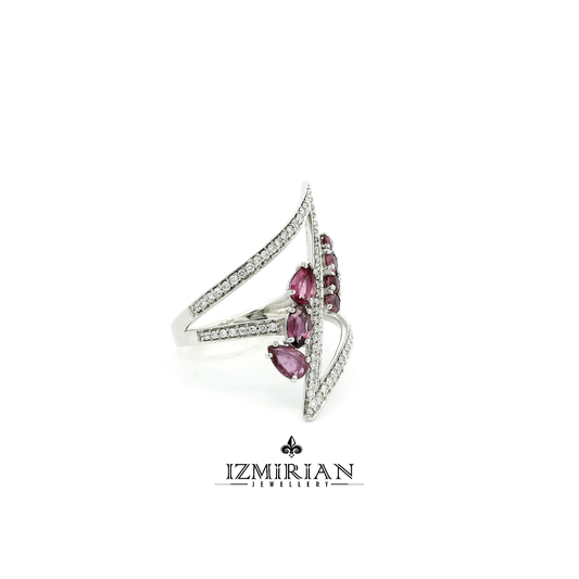 Side view of white gold lightning ring with pavé diamonds and rubies