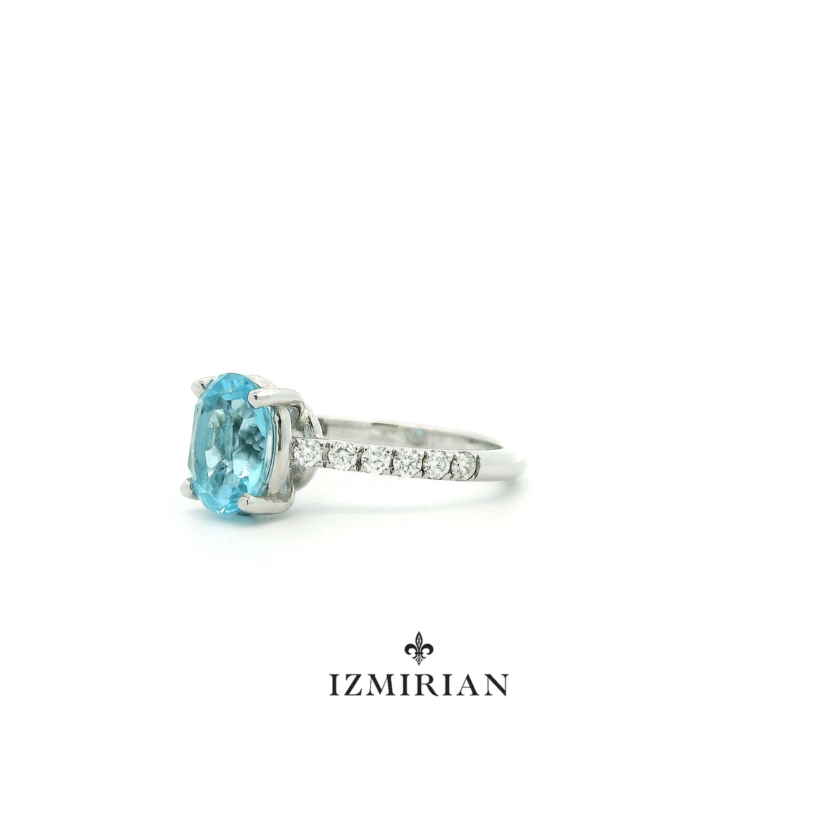 Blue Topaz Solitaire Diamond Ring
