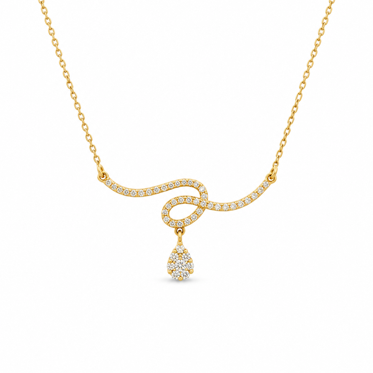 A gold necklace with a wavy chain design paved with small clear stones, featuring a teardrop-shaped pendant also set with clear stones, shown on a plain white background.