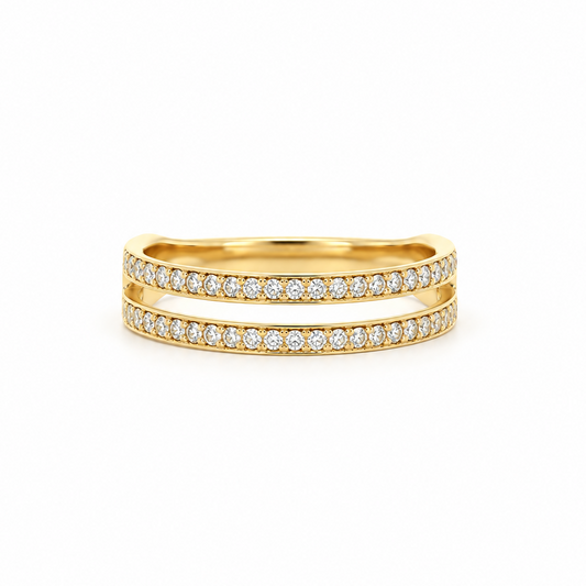 A pair of slim yellow gold eternity rings set with round-cut diamonds, displayed on a clean white background.