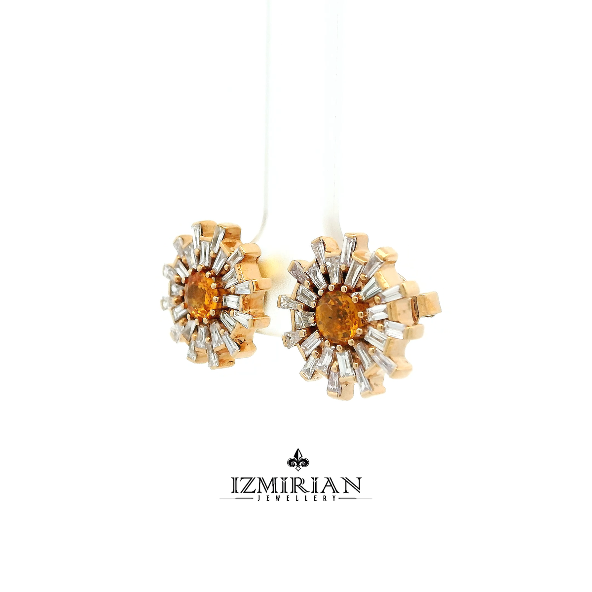 Angled view of orange sapphire sunburst earring with rose gold and diamond detailing