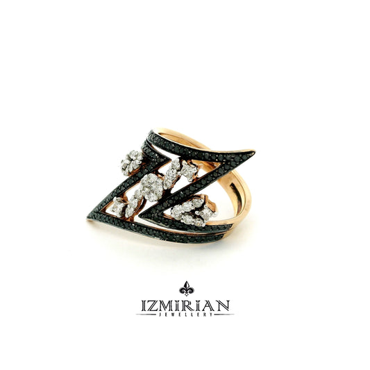 Angled view of zigzag rose gold ring with black diamond accents