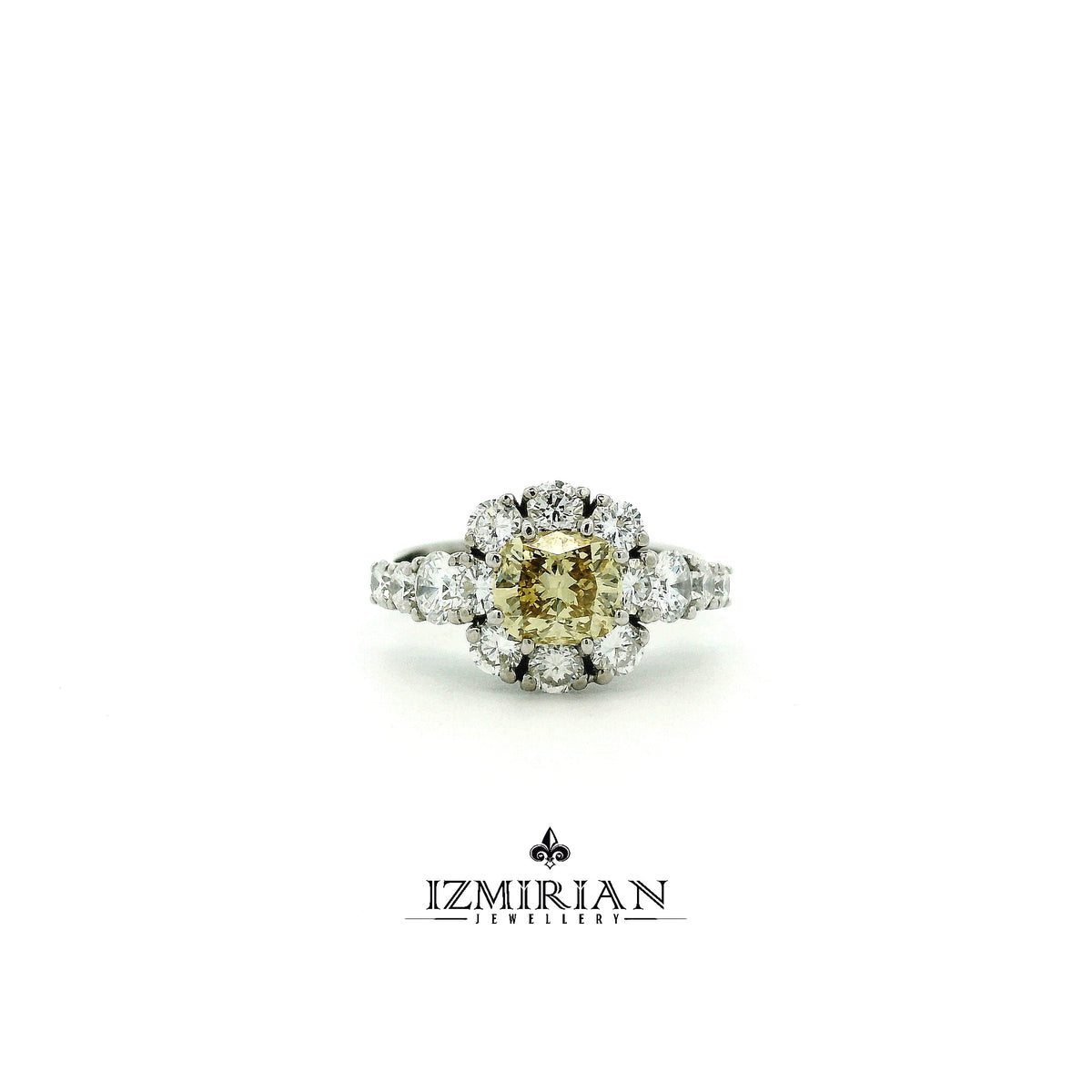 White gold ring with brown cushion diamond and white diamond cluster