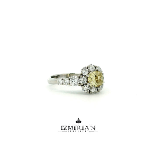 Side view of white gold ring with brown diamond center and white diamond accents