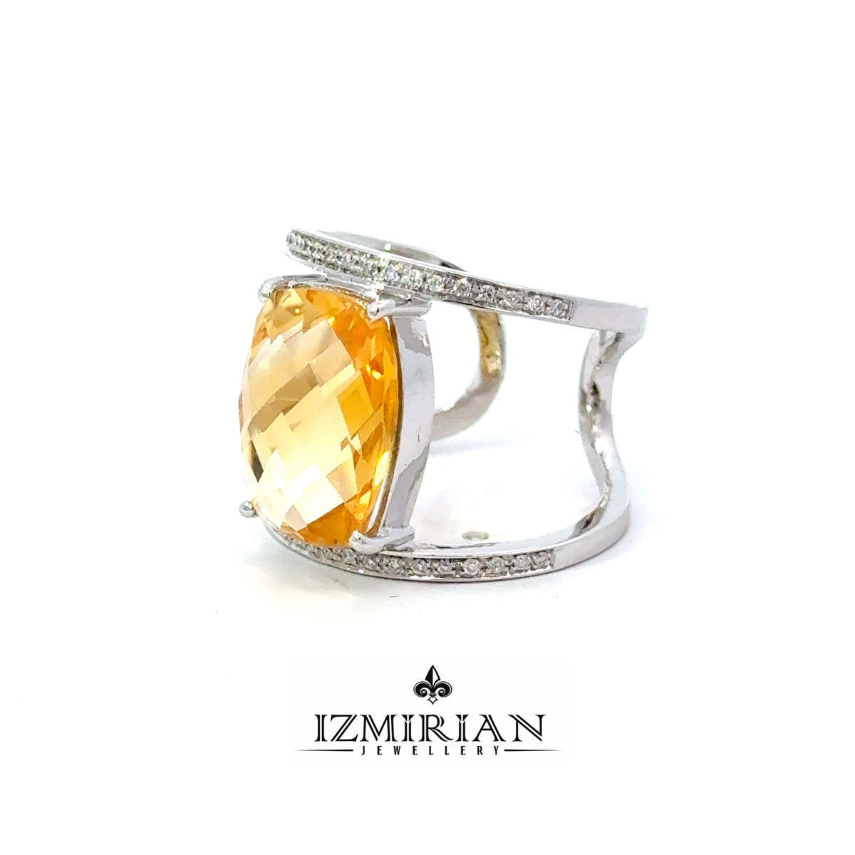 Angled view of open cuff citrine ring with pavé diamonds