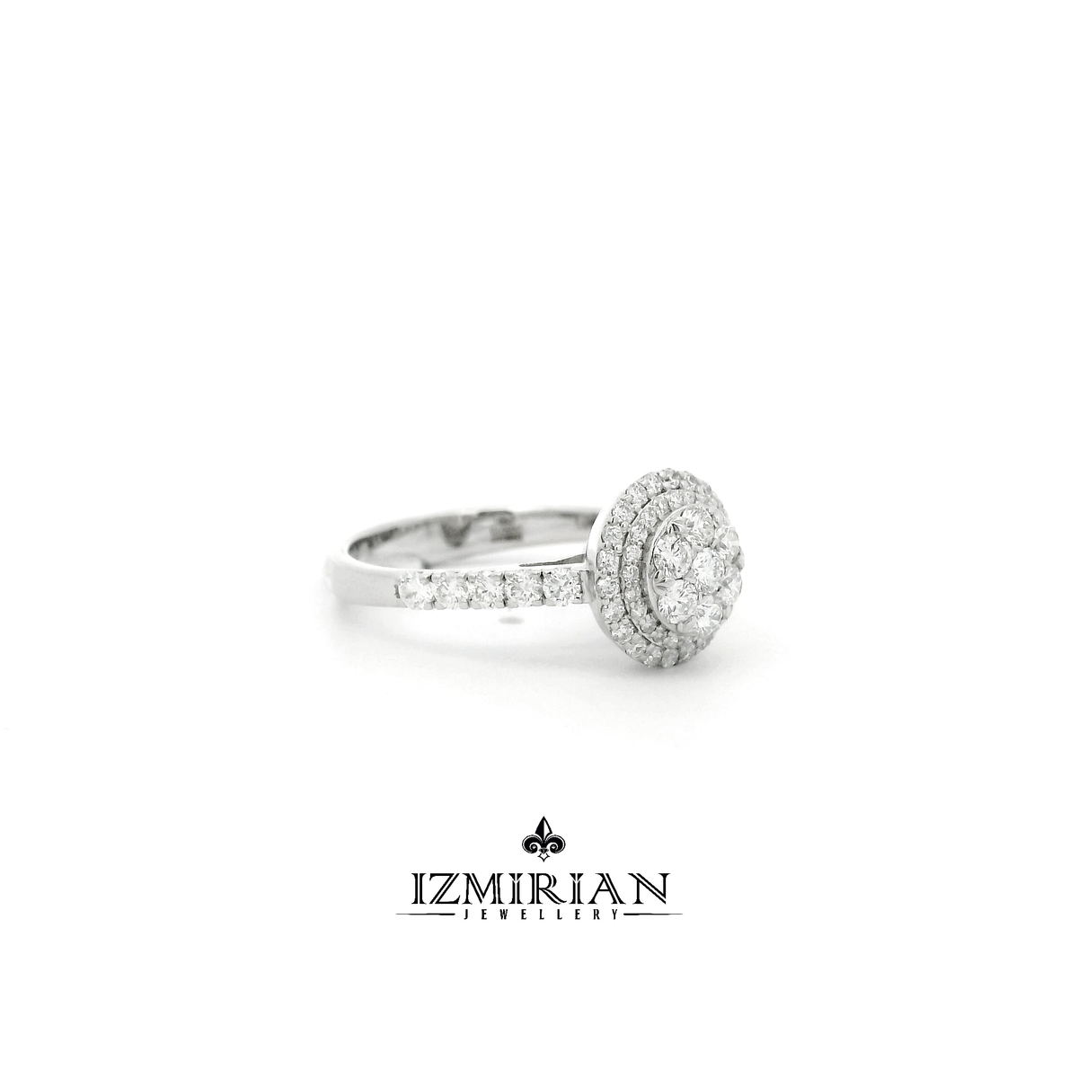 Side view of white gold ring with diamond cluster and pavé band