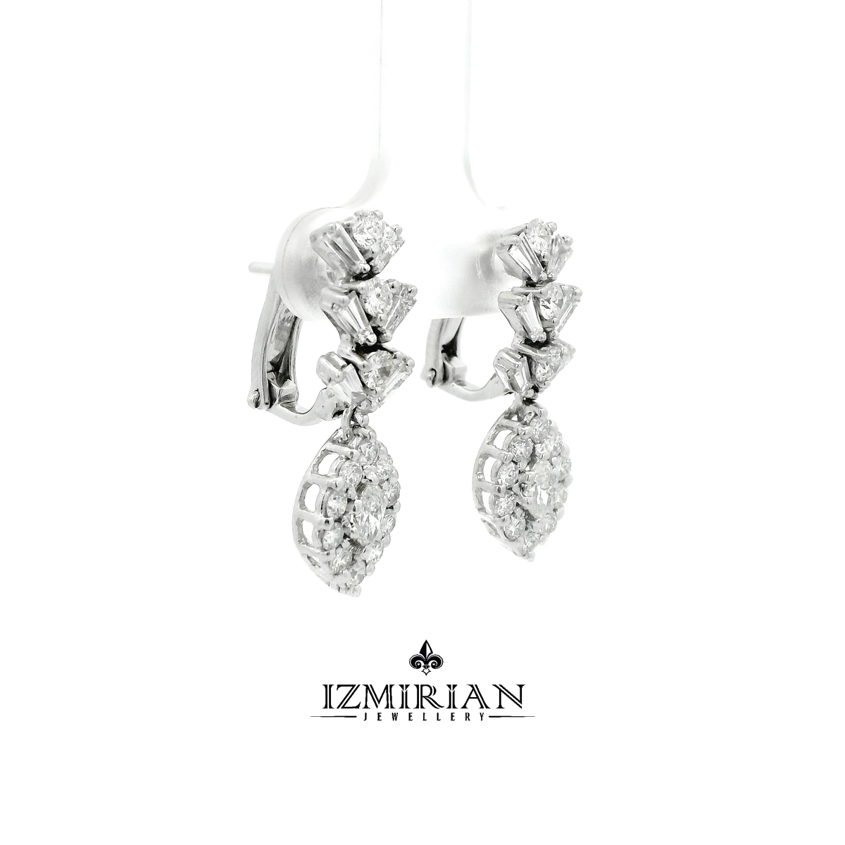 Side view of white gold earrings with layered diamond drops