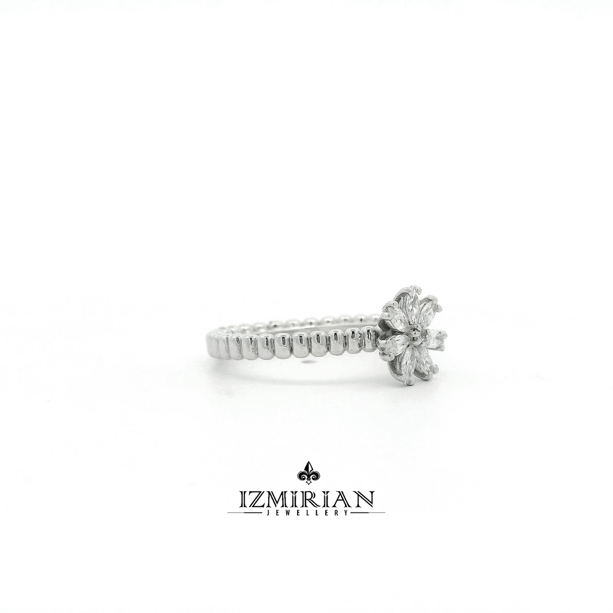 Side view of white gold diamond floral cluster ring