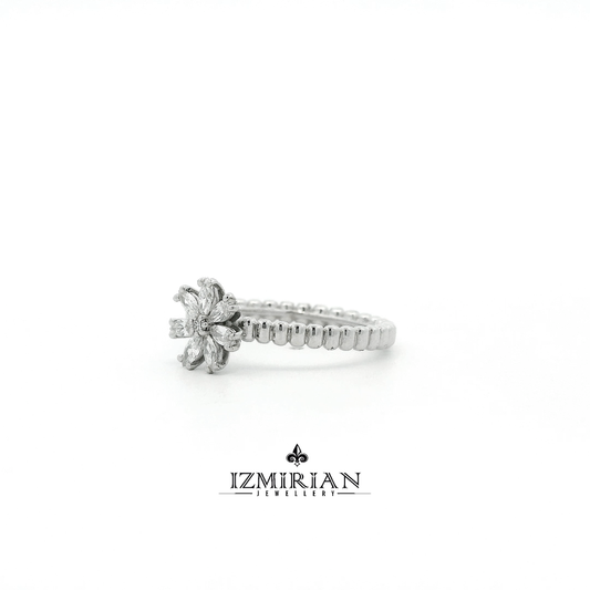 Angled view of marquise diamond flower ring in white gold