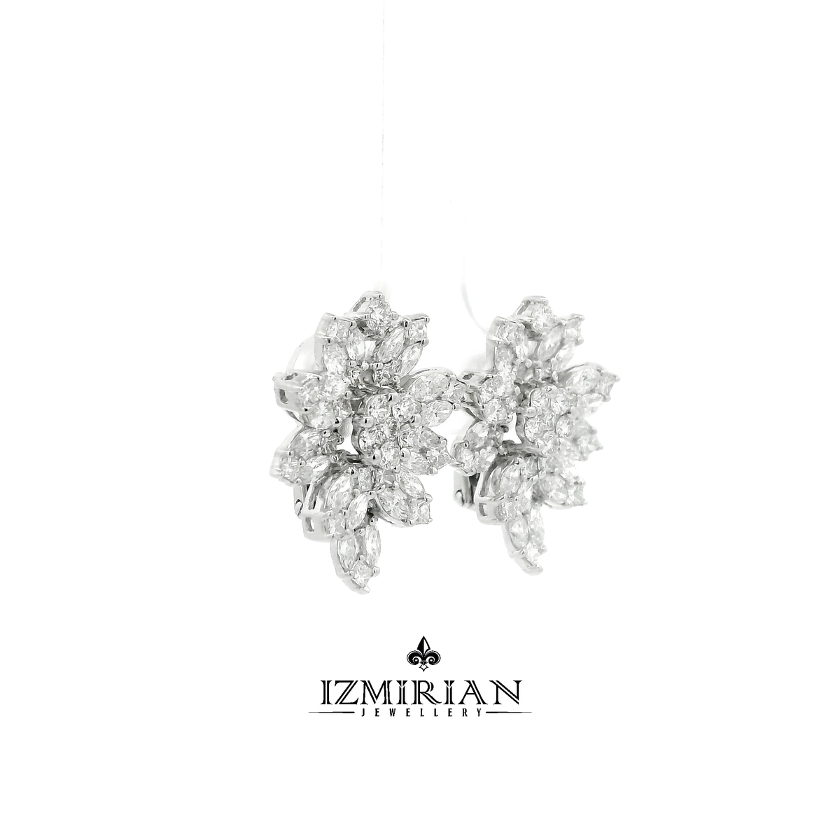 Side view of white gold diamond flower cluster stud earrings