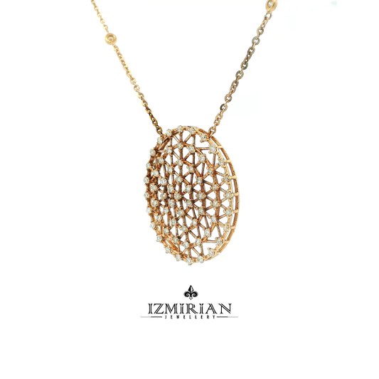Angled view of diamond lattice pendant in yellow gold