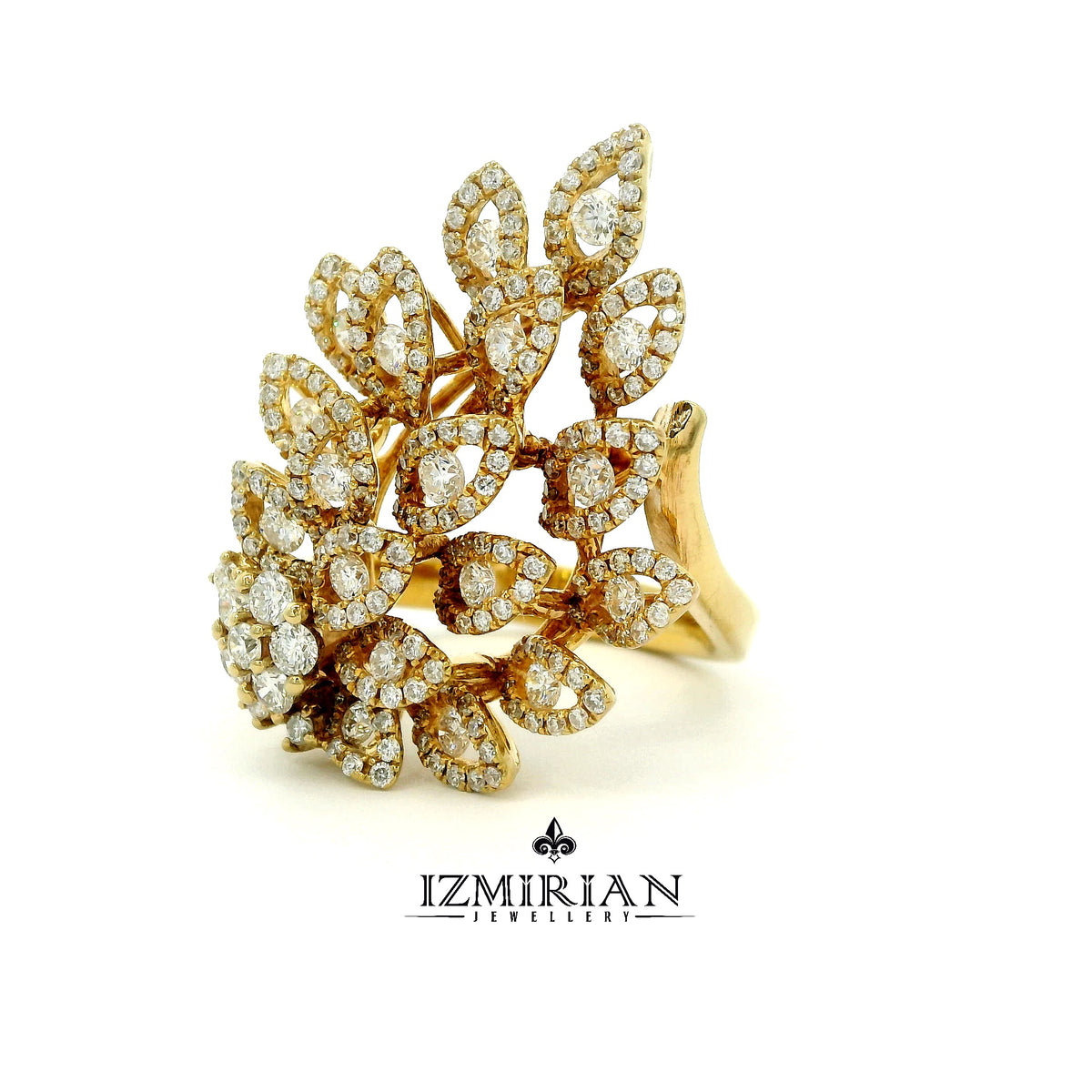 Angled view of layered diamond leaf ring in yellow gold