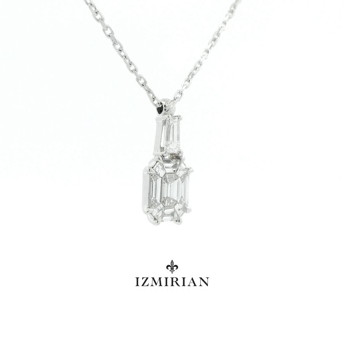 Side view of white gold emerald-cut diamond geometric pendant