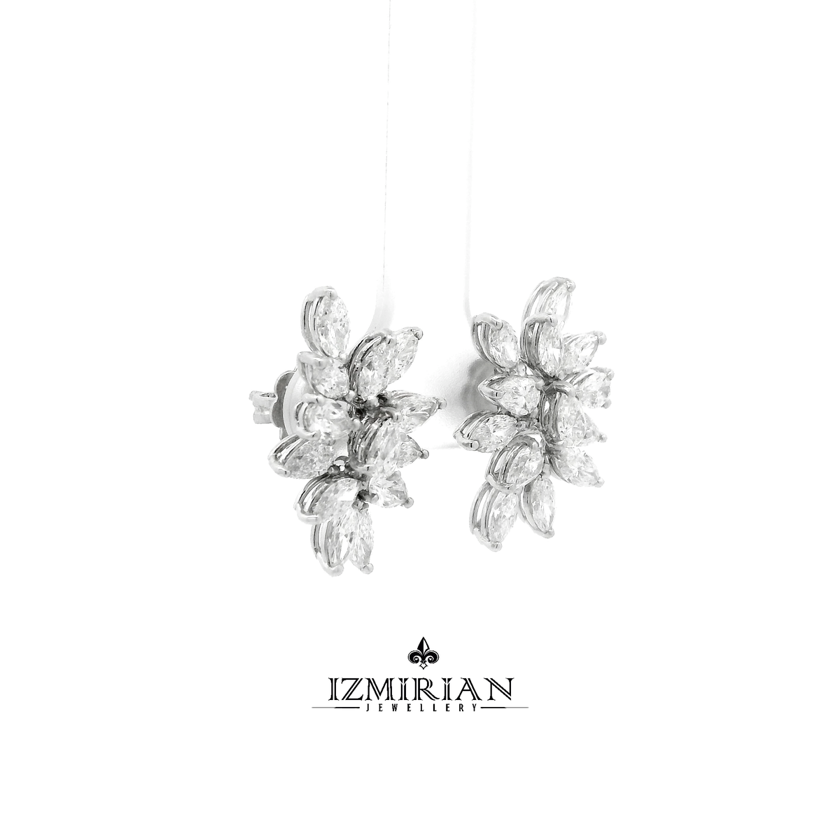 Side view of white gold marquise diamond cluster stud earrings
