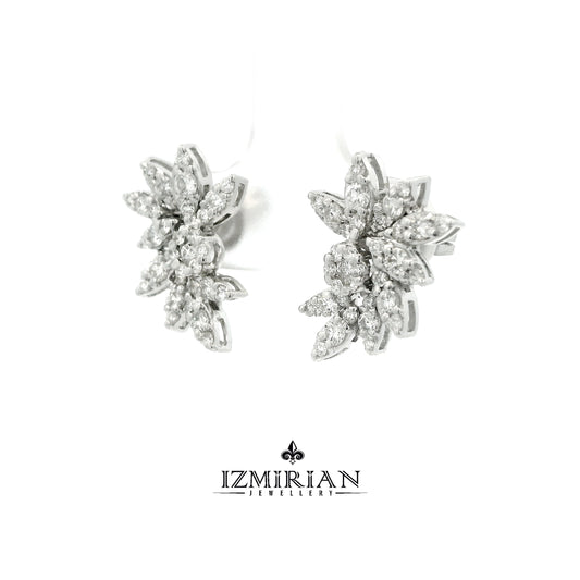 Angled view of marquise diamond flower earrings in white gold