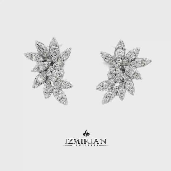 Marquise diamond floral stud earrings in white gold shown in motion