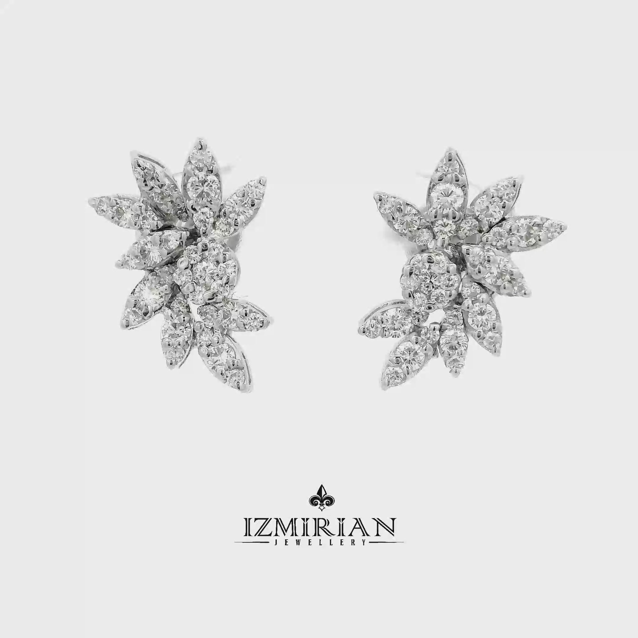 Marquise diamond floral stud earrings in white gold shown in motion