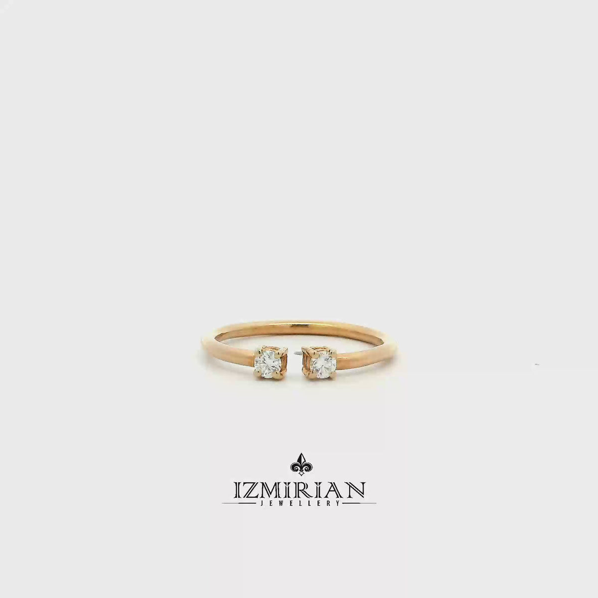 Diamond Toi et Moi open ring in yellow gold shown in motion