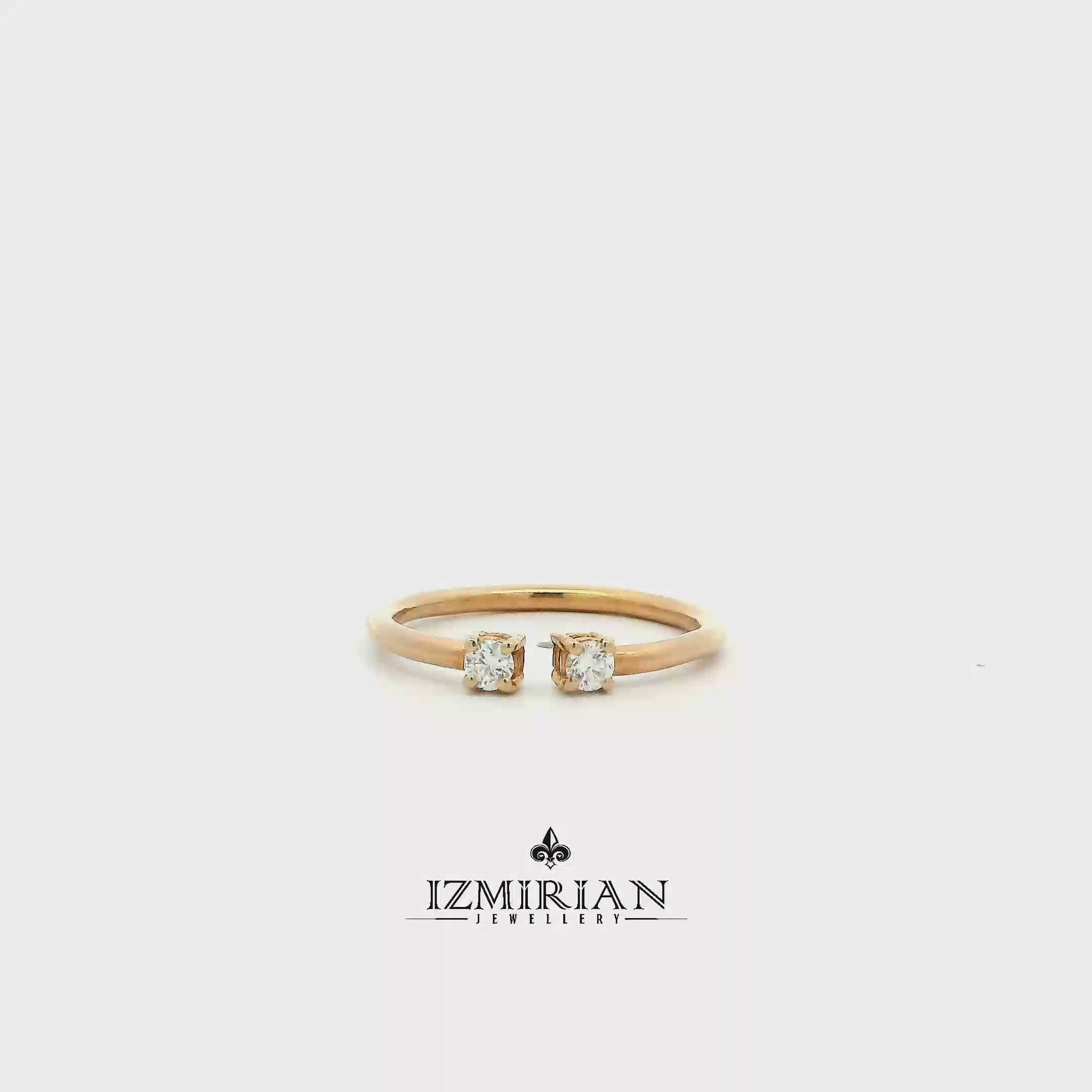 Diamond Toi et Moi open ring in yellow gold shown in motion