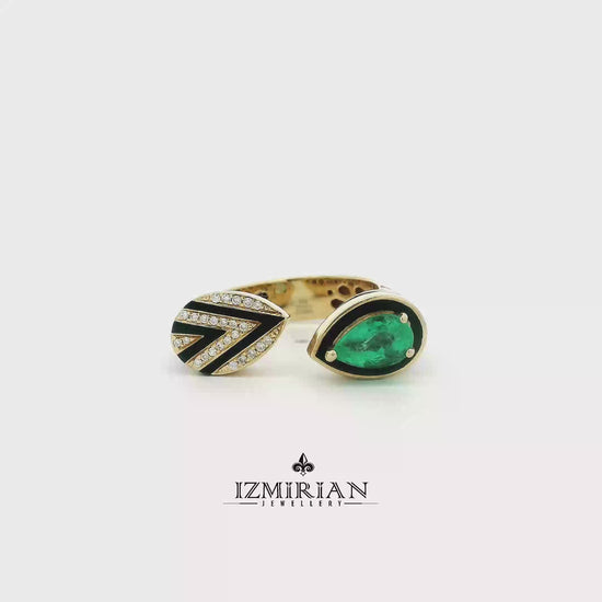 Emerald and diamond open cuff ring with black enamel shown in motion