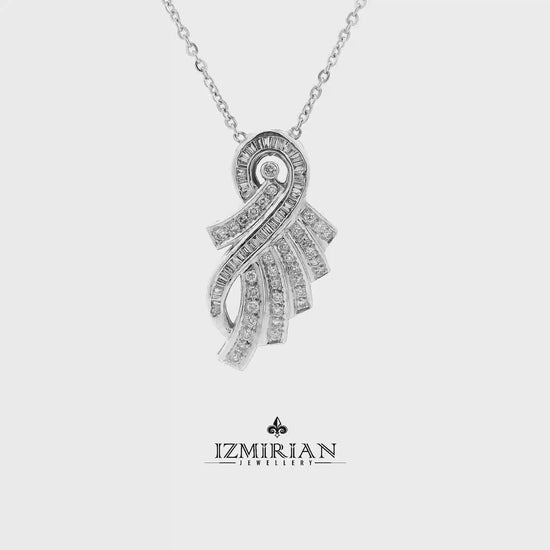 Diamond ribbon pendant in white gold shown in motion