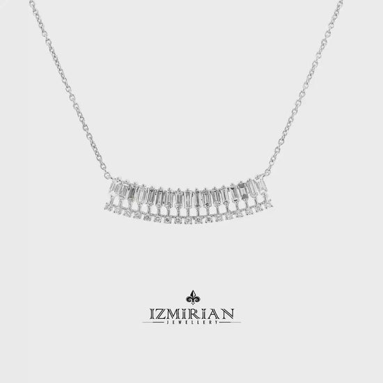 Baguette diamond bar necklace in white gold shown in motion
