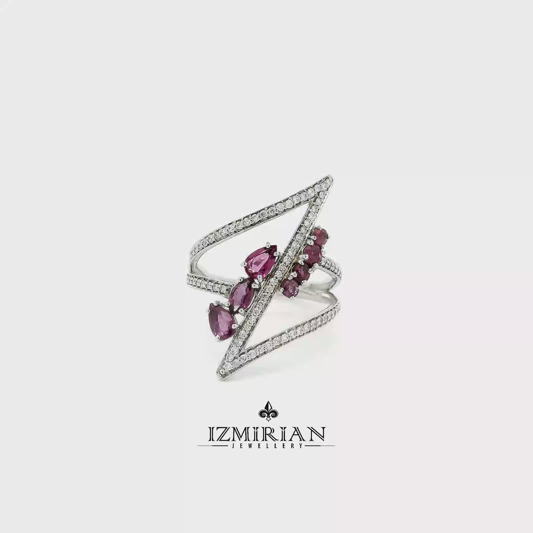 Diamond and ruby lightning wrap ring in white gold shown in motion