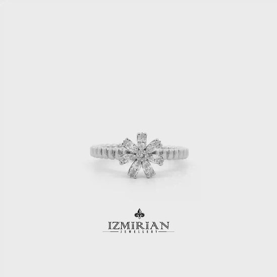 Diamond floral cluster ring in white gold shown in motion