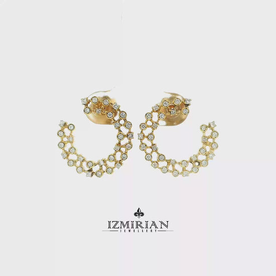 Diamond lattice open hoop earrings in yellow gold shown in motion