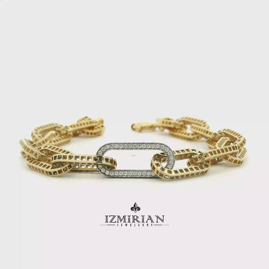 Diamond link chain bracelet in yellow and white gold shown in motion