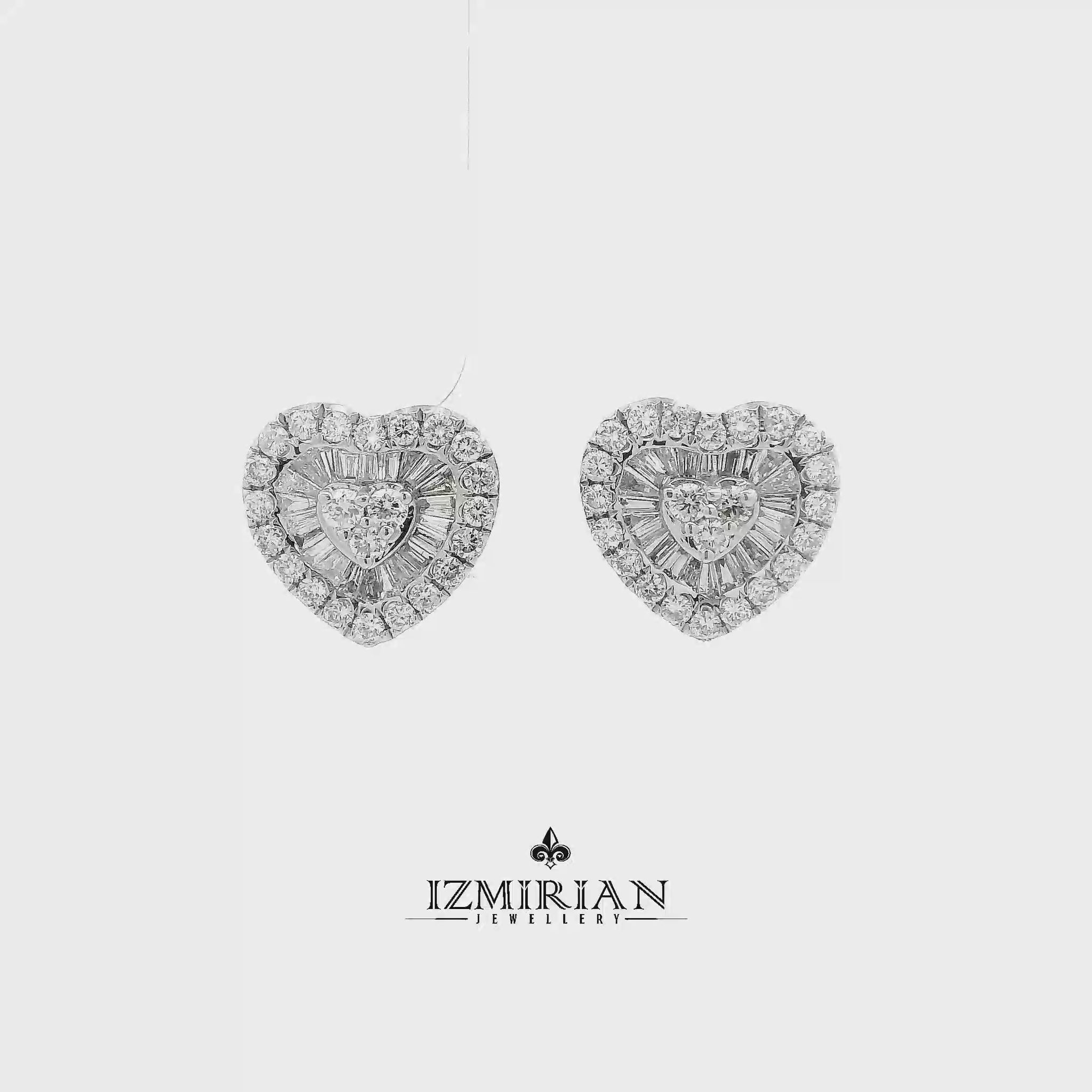 Heart diamond cluster pendant in white gold shown in motion