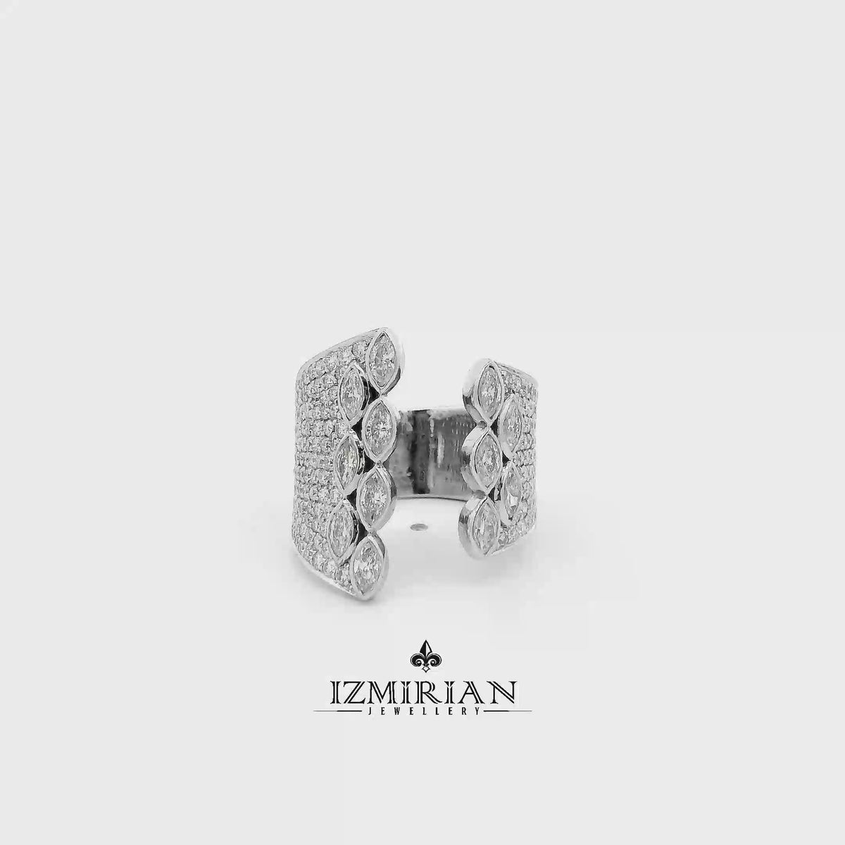 Marquise diamond pavé cuff ring in white gold shown in motion