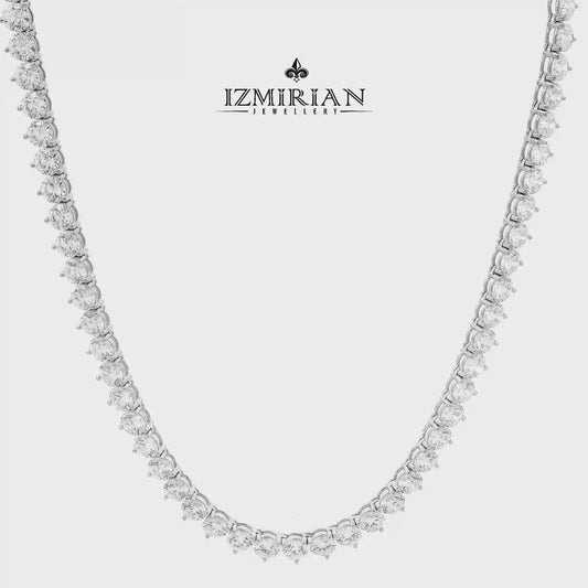 Classic diamond tennis necklace in white gold shown in motion