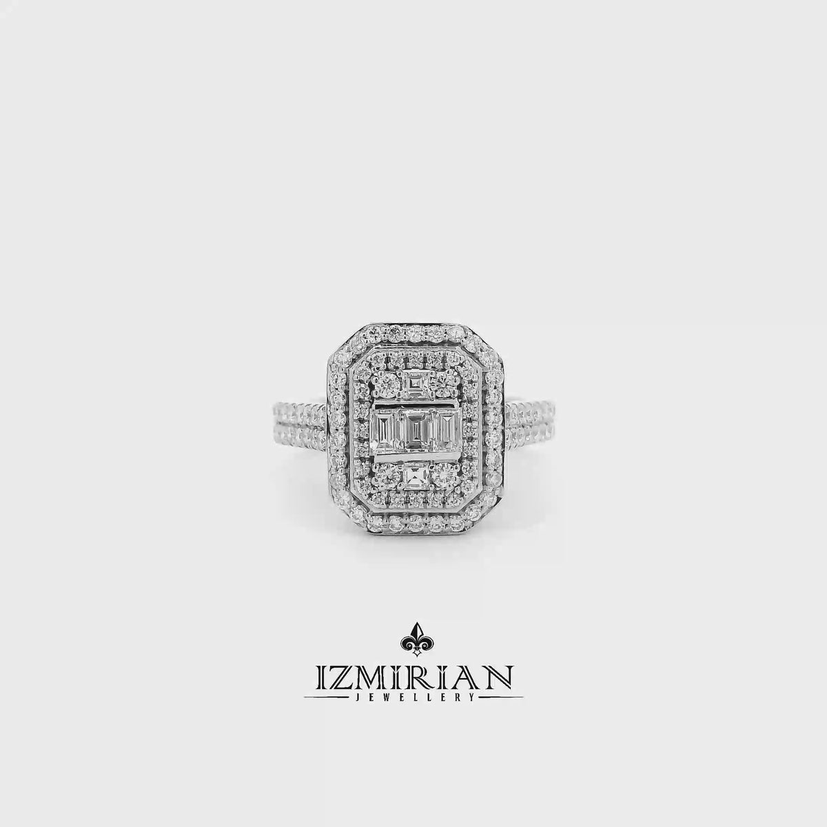 Baguette and diamond halo ring in white gold shown in motion