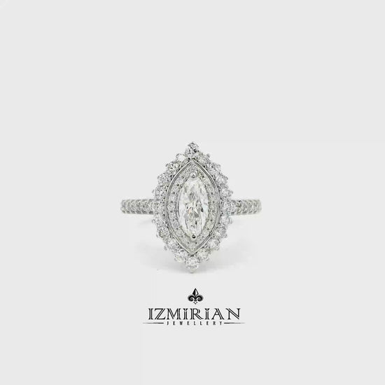 Marquise diamond halo ring in white gold shown in motion