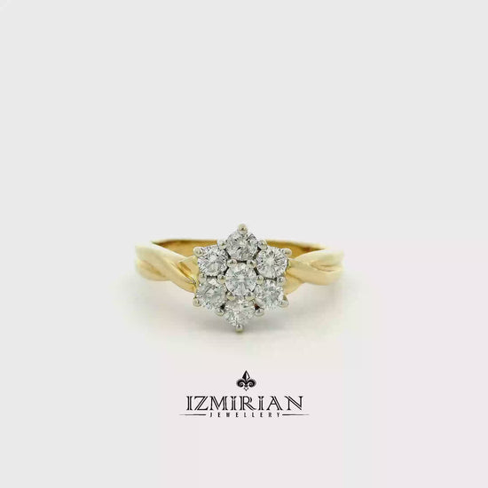 Diamond cluster ring in yellow gold shown in motion