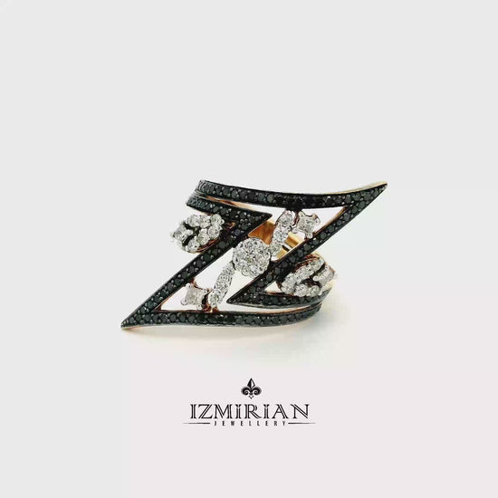 Black and white diamond zigzag ring in rose gold shown in motion