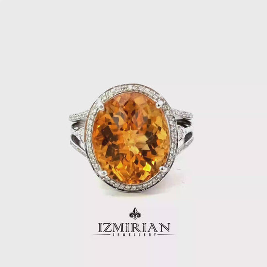 White gold open cuff ring with oval citrine shown in motion