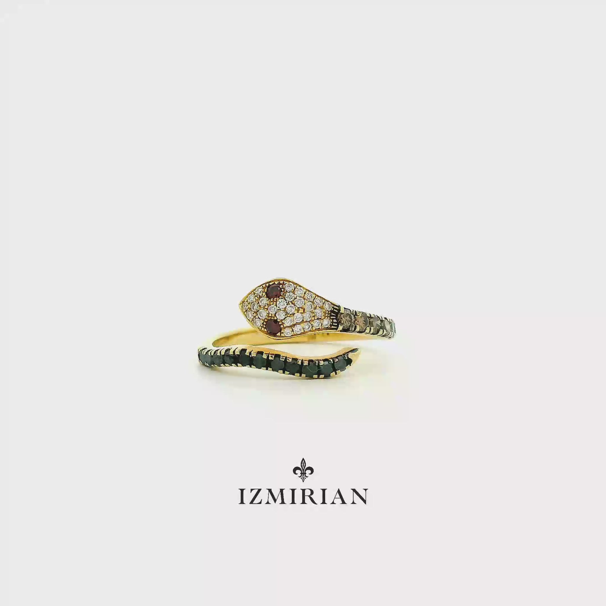 Diamond pavé snake ring in yellow gold shown in motion