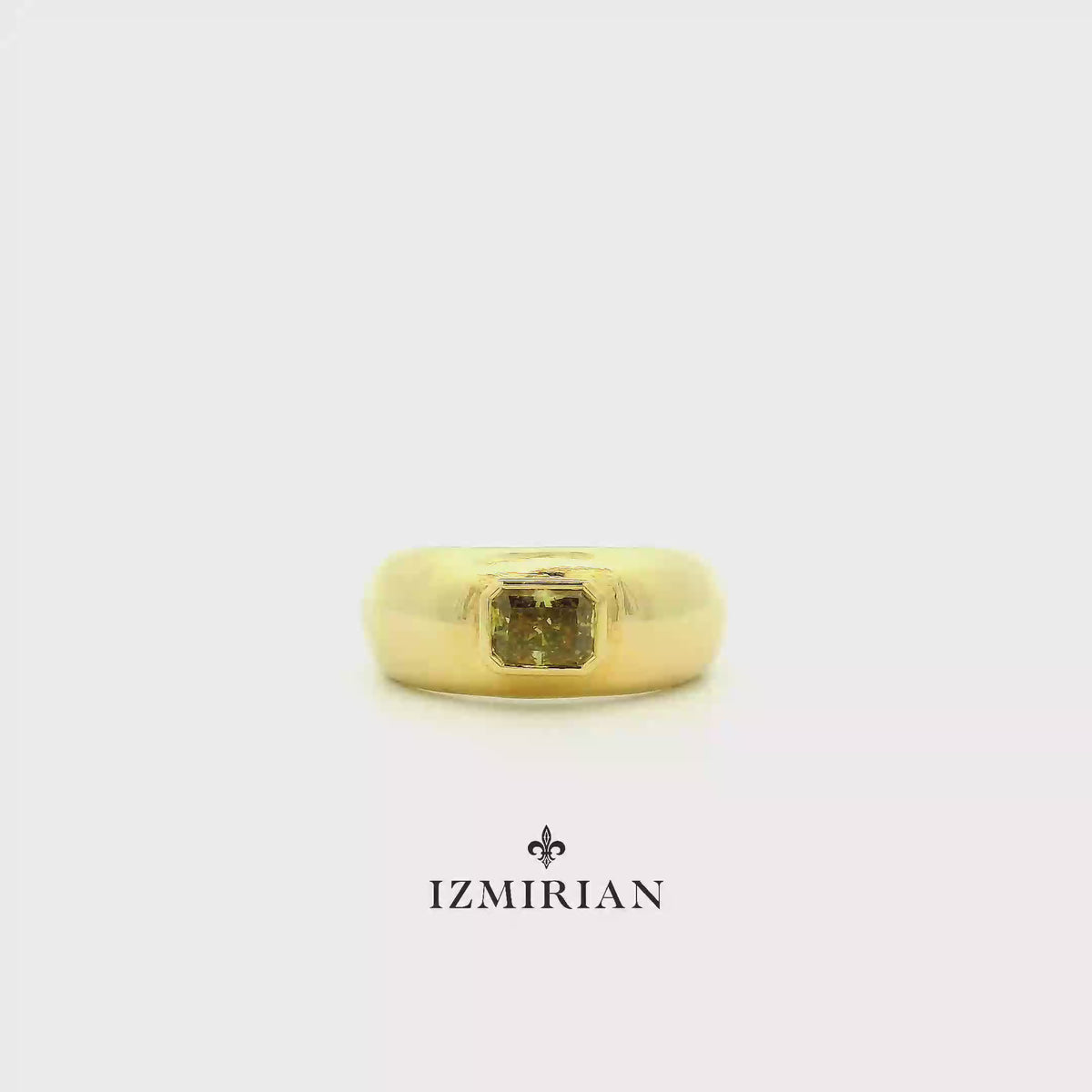 Yellow gold signet ring with square yellow diamond shown in motion