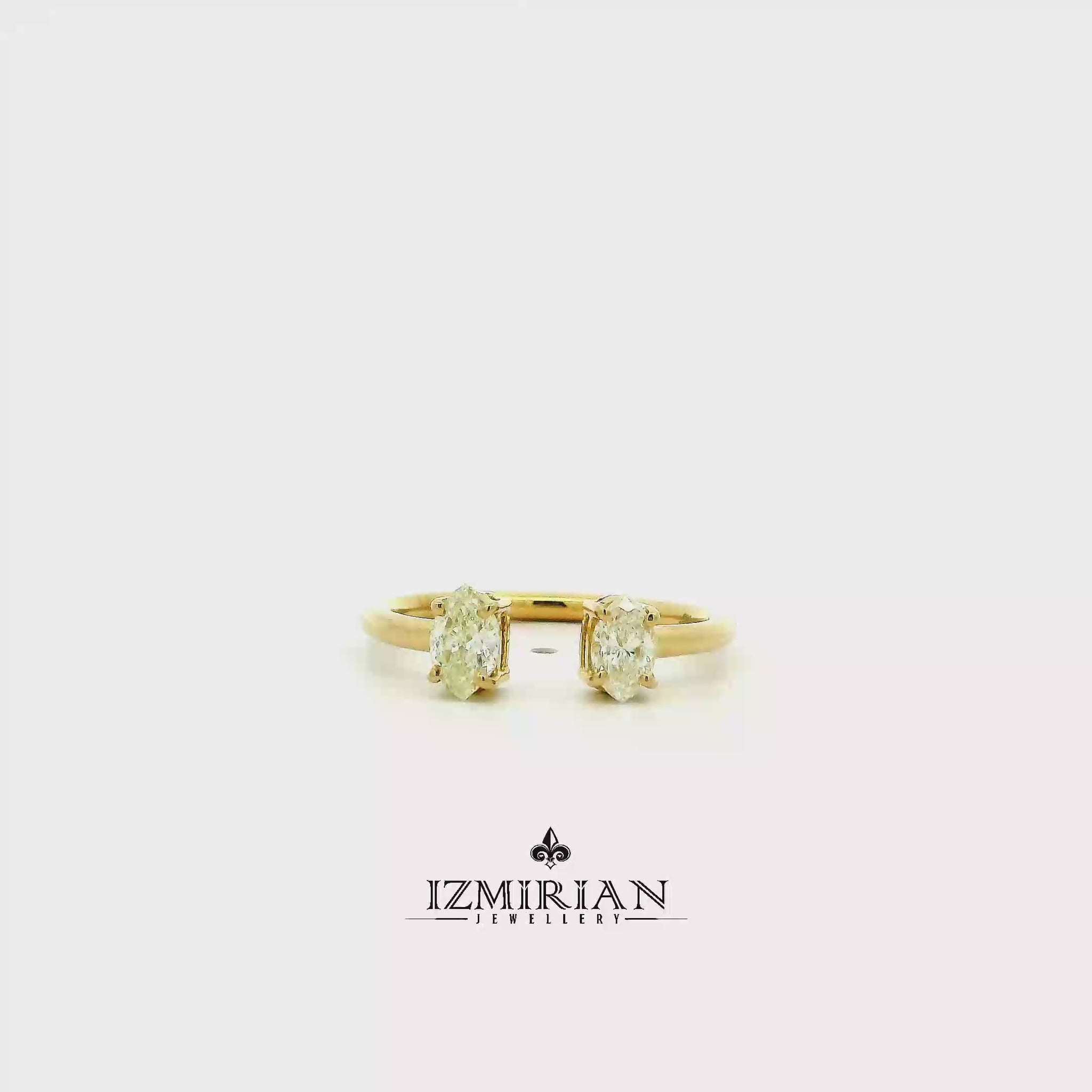 Diamond Toi et Moi ring in yellow gold shown in motion