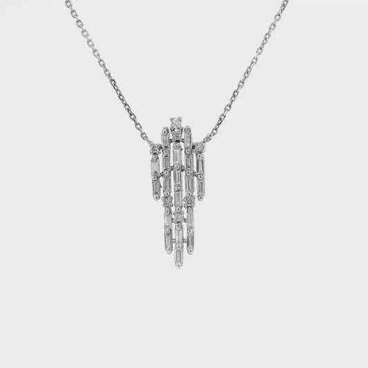 Baguette diamond cascade pendant in white gold shown in motion
