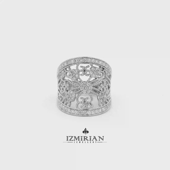 Diamond lace wide band ring in white gold shown in motion