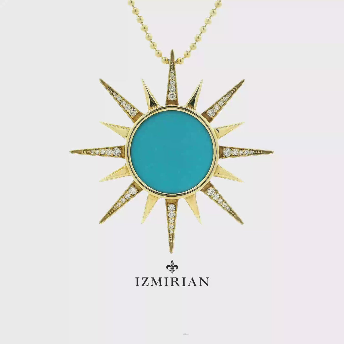 Yellow gold turquoise sunburst pendant shown in motion