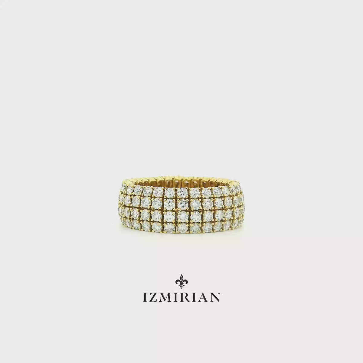 Yellow gold wide pavé diamond band ring shown in motion
