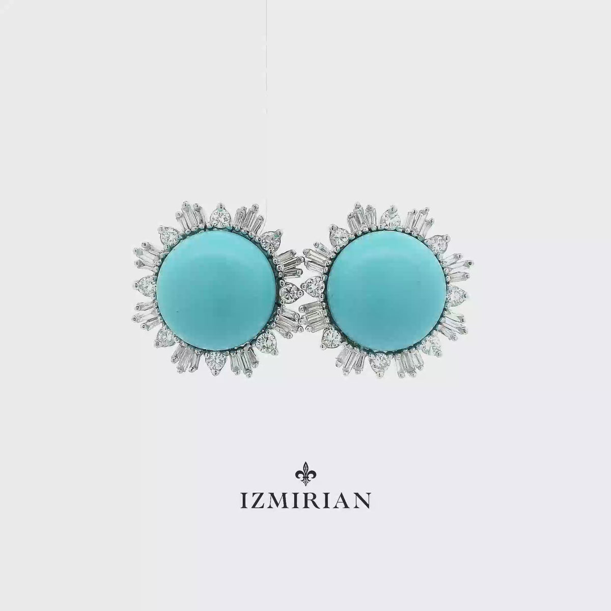 Turquoise diamond halo stud earrings in white gold shown in motion